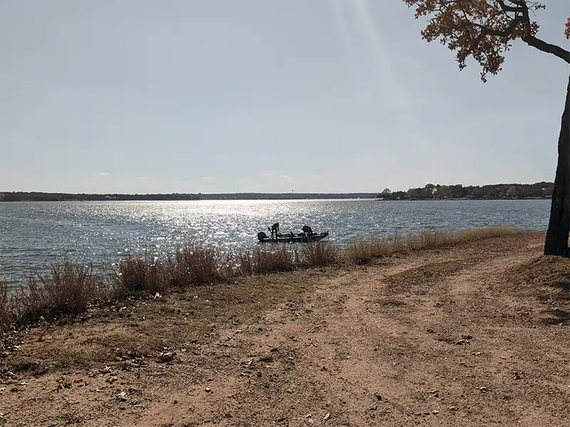 Photo of people fishing at joe benton park, lake nocona, texas