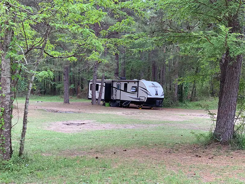 Photo of an RV camping at kellys pond campground in texas