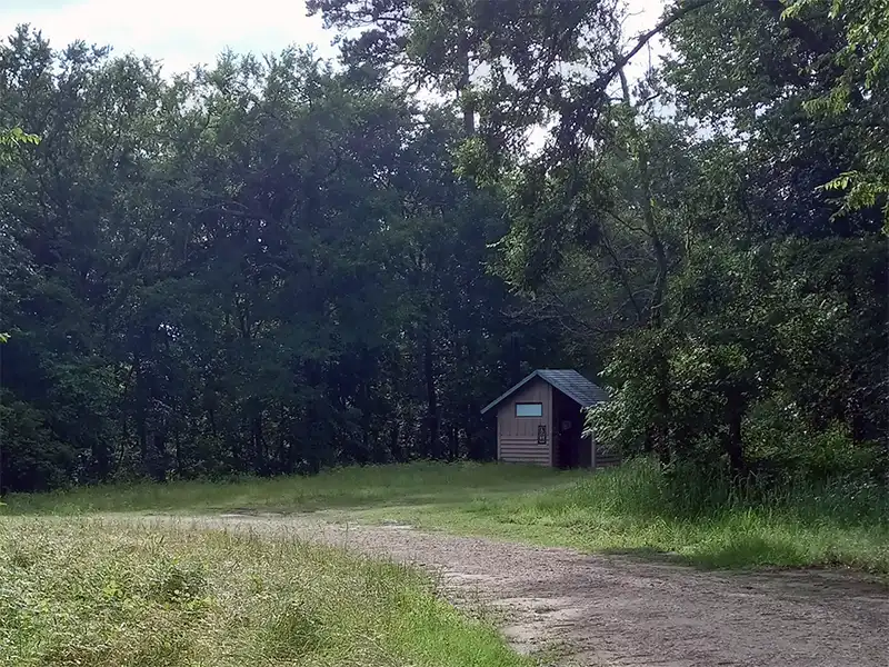 Photo of the vault toilet at neches bluff overlook at davy crockett national forest in texas