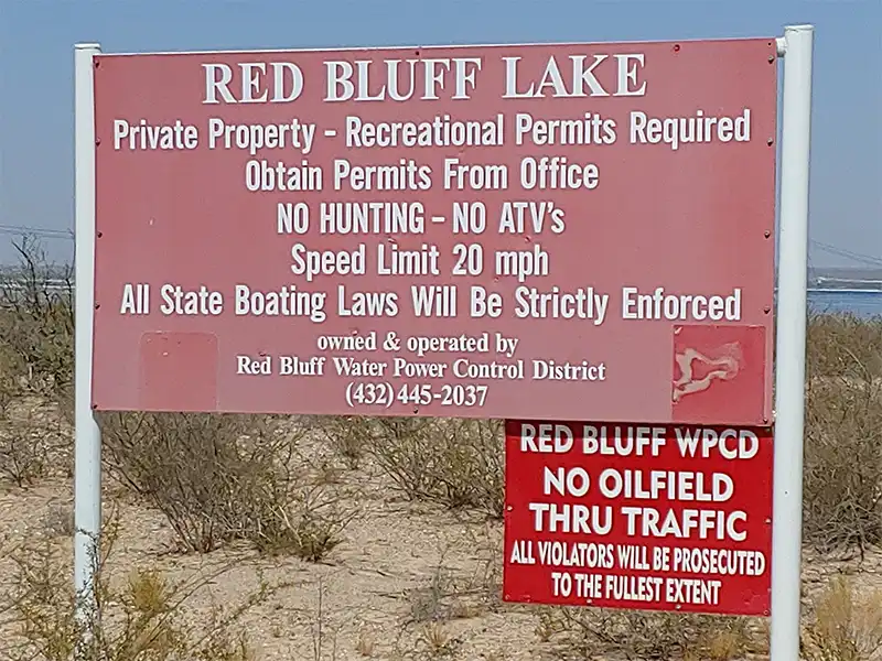 entrance sign for red bluff reservoir, texas