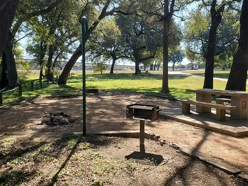 a campsite at soldiers creek park campground at lake whitney, texas
