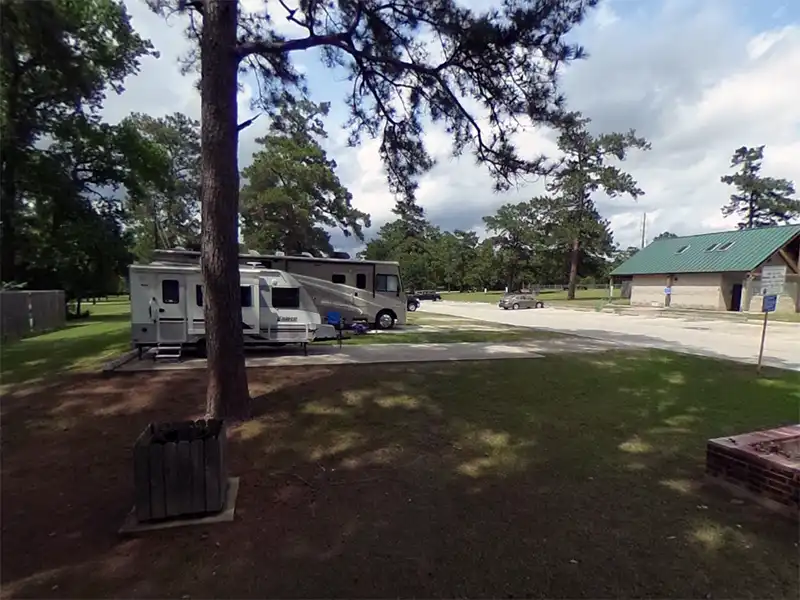 Photo of the RV campground with the restroom at spring creek park campground in harris county, texas