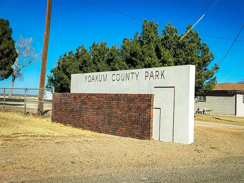 entrance sign for yoakum county park campground
